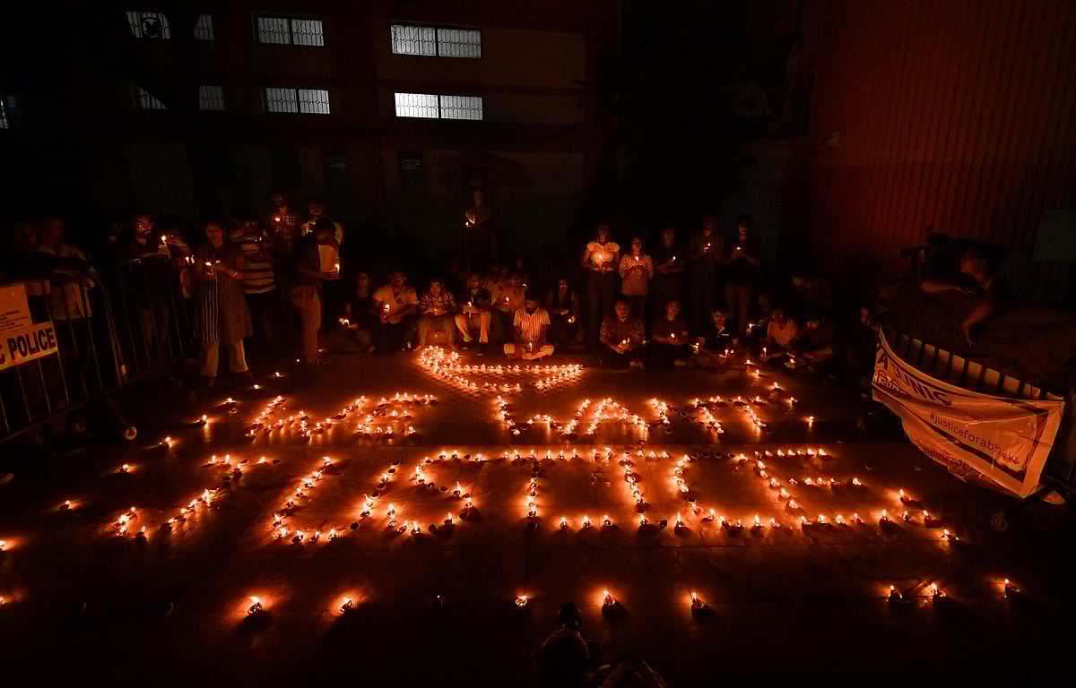 Doctors and health workers light candles depicting "We Want Justice" at the RG Kar Medical College and Hospital against the alleged rape and murder of a trainee woman doctor inside the hospital premises, in Kolkata - PTI/File